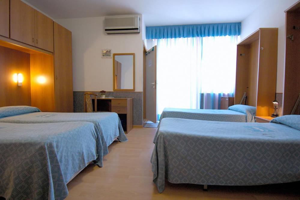 Hotel Ai Pini Grado Habitación foto