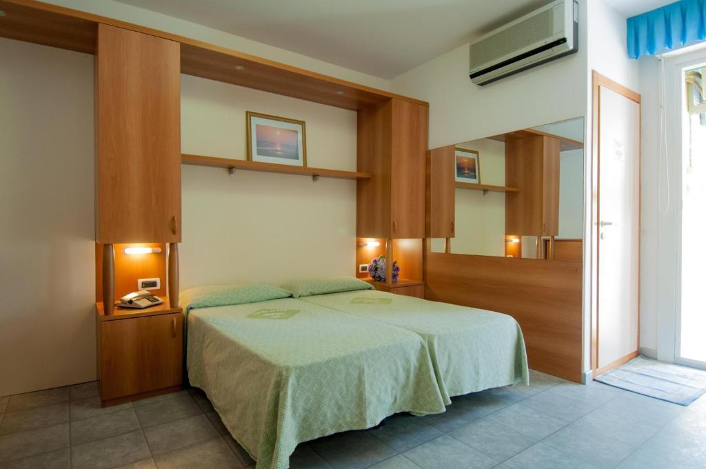 Hotel Ai Pini Grado Habitación foto